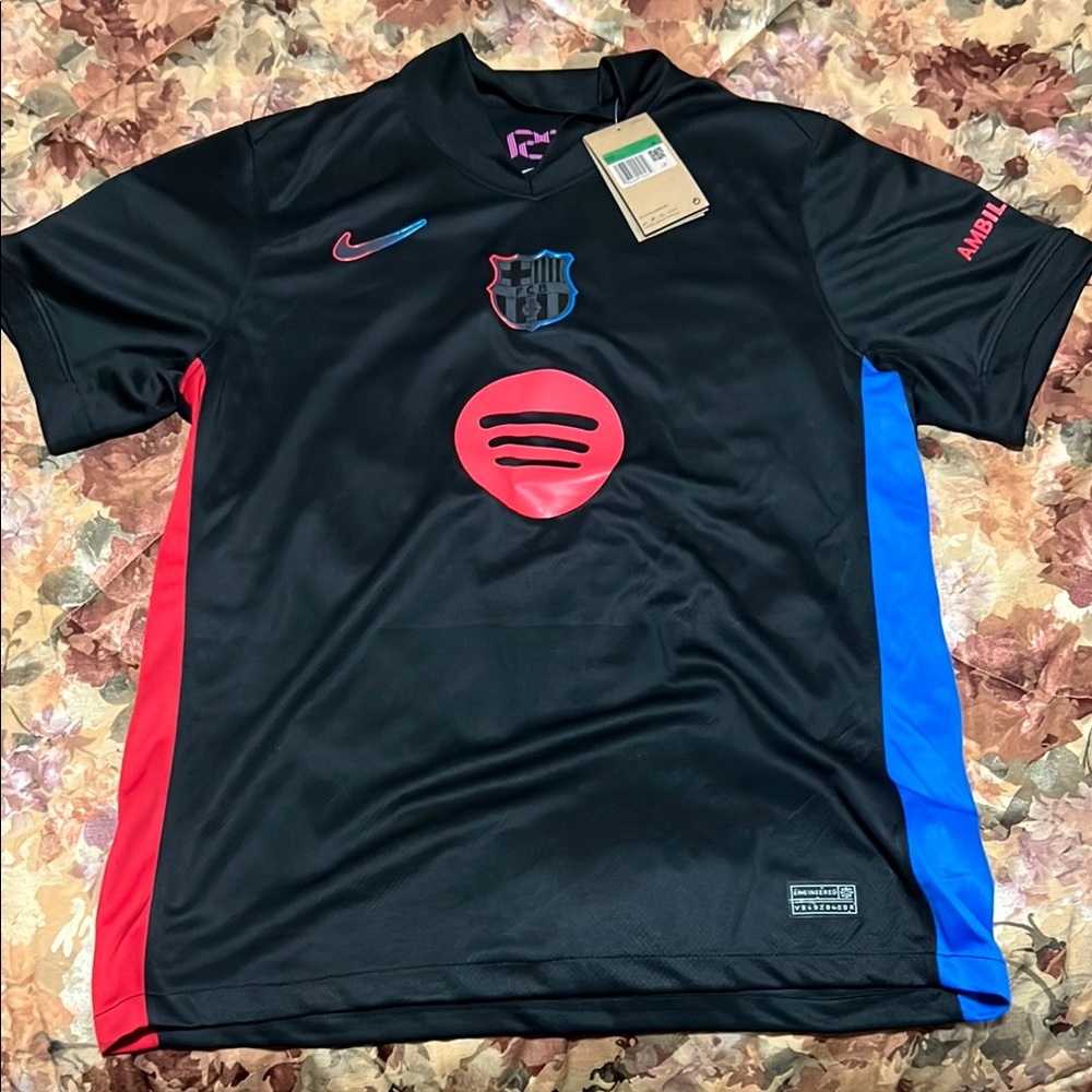Black Nike Soccer Jersey with Red and Blue Accents